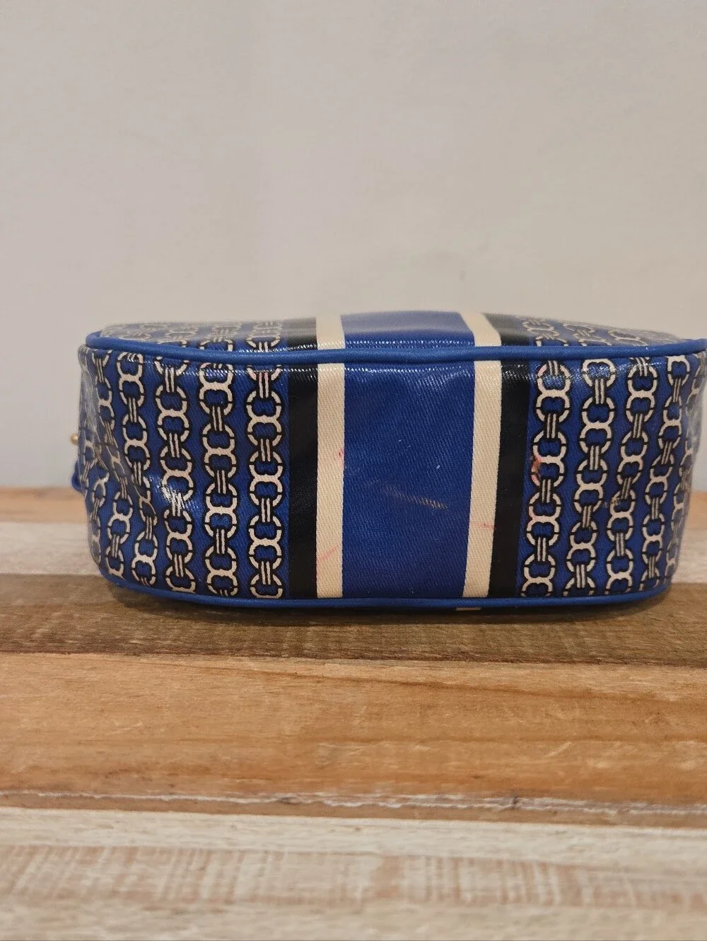Tory Burch Gemini Link Stripe Makeup Bag With Vertical Striped Design.